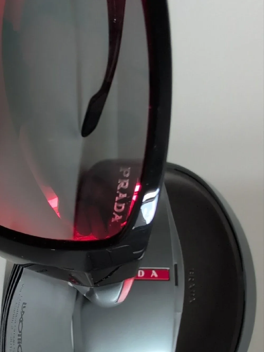 Prada Black Sunglasses with Red-Orange Mirrored Lenses